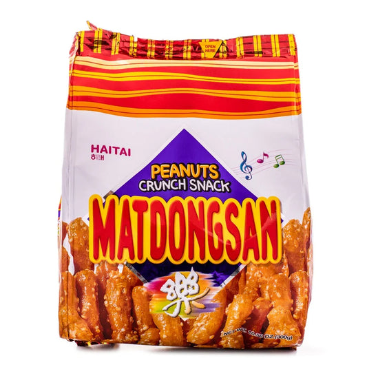 Haitai Matdongsan Peanut Crunch Snack, a crispy Korean treat with sweet syrup and crushed peanuts.