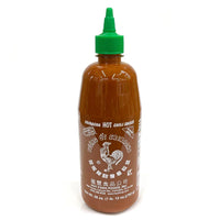 Huy Fong Sriracha Chili Sauce bottle featuring iconic rooster logo and bold garlic-red color.